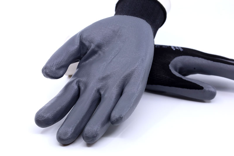 Slät nitrilbelagd handske